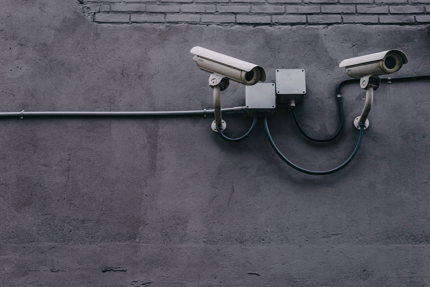 Security cameras mounted on the wall.