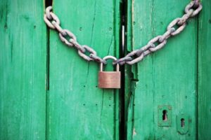 Chained door with a lock